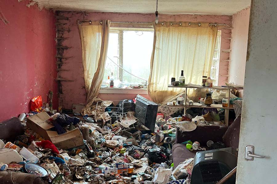 A room full of clutter and rubbish in the house of a hoarder